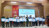 Gifts presented to landmine victims in Huong Khe district